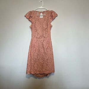 Lightly worn. Boutique pink lace open back mini dress. Size small.